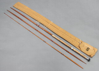 Sharpes of Aberdeen, a 14' spliced split cane salmon fishing rod in original cloth bag 