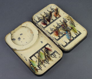 A large Hardy Brothers salmon and fly fishing box with swing leaf, containing a large collection of 1920's salmon flies 3cm h x 20cm w x 13cm d 