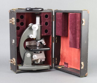 G Barker, a 40121 single pillar student's microscope complete with carrying case marked Bristol College of Science and Technology 