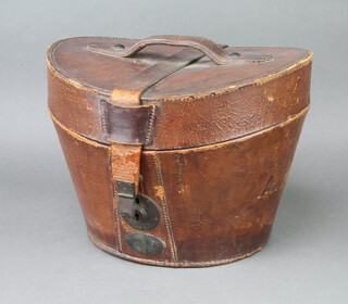 Woodrow of Glasgow, a gentleman's black silk top hat size 7, together with a leather carrying case 
