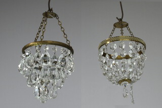 Two gilt metal and cut glass bag shaped light fittings 17cm x 15cm and 17cm x 17cm 