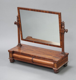 A Victorian rectangular plate dressing table mirror contained in a mahogany swing frame, base fitted 2 secret drawers, raised on turned supports 68cm h x 70cm w x 28cm d 