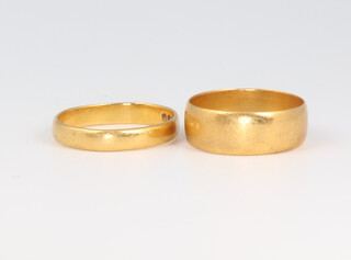 Two 22ct yellow gold wedding bands 5.9 grams, size K and K 
