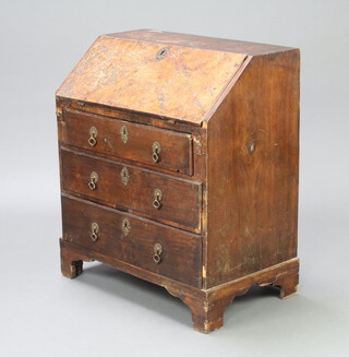 An 18th/19th Century walnut bureau of small proportions, the fall front revealing a well fitted interior, pigeon holes and drawers above 3 long graduated drawers, raised on bracket feet 78cm h x 69cm w x 40cm d 