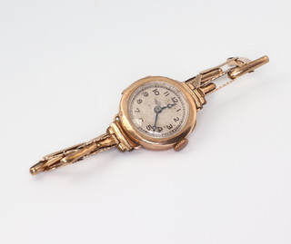 A lady's 9ct yellow gold wristwatch on a ditto expanding bracelet, gross weight 14.3 grams