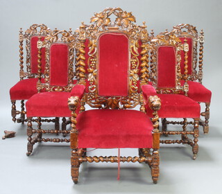 A set of 7 Victorian heavily carved oak Carolean style high back dining chairs comprising 1 carver with lion masks to the arms and 6 standard chairs, the seats and backs upholstered in red material, the carver 130cm h x 67cm w x 65cm d (seat 31cm x 35cm), standard chairs 106cm h x 49cm w x 45cm d (seat 24cm x 29cm)