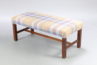 A Georgian style rectangular stool with tartan upholstered seat raised on square reeded supports with H framed stretcher 41cm h x 104cm w x 48cm d 