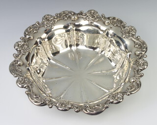 An Edwardian repousse silver bowl with floral rim, Birmingham 1904, 28cm, 454g