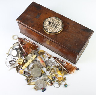 A quantity of vintage and other costume jewellery and coins contained in a mahogany box 