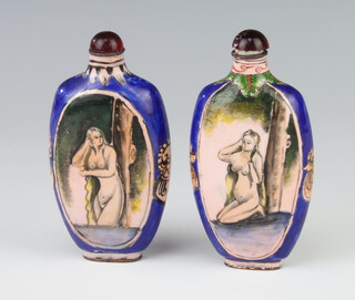A pair of modern enamelled flattened scent bottles decorated with naked ladies 10cm 