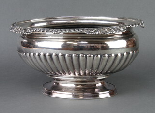 A Victorian silver plated demi fluted bowl with engraved crest 33cm 