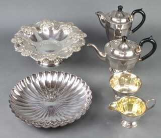 A silver plated pedestal bowl with pierced rim, a 3 piece tea set and a shallow dish 
