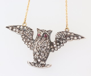 An Edwardian style diamond and ruby owl pendant, 6.8gms, diamonds approx. 1.0ct, 42mm x 20mm 