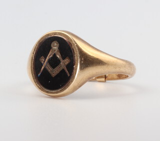 A gentleman's 9ct yellow gold Masonic swivel signet ring size U, gross weight 8gms