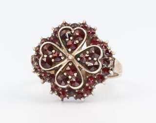 A silver and garnet set dress ring, 4.5gms, size N 1/2