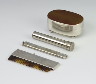 A white metal agate mounted oval trinket box, 6cm, a silver pencil holder mounted comb and a chrome case