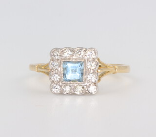 An Edwardian style yellow metal 18ct aquamarine and diamond set ring, the centre stone 0.25ct, the brilliant cut diamonds 1.0ct, size N 1.2, 2.3gms 
