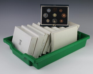Twelve United Kingdom uncirculated coin sets - 1983,89,90,91,91,92,93,93,94,95,97 and 1998 