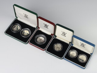 Two silver proof 10 pence coins 1992, two 50 pence coins 1997, a ditto 1994 and a 2 pound coin 