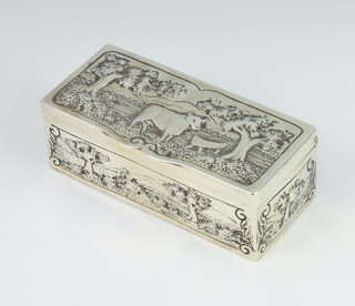 A George III rectangular repousse silver trinket box decorated with a cow beneath trees, the sides with landscape views, London 1806, 10cm, 132gms