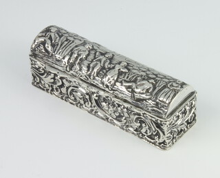 An Edwardian repousse silver domed lid ring box decorated with revellers and scrolls, Chester 1907, 10cm 60grms gross