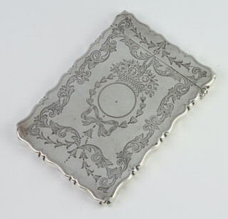 An Edwardian engraved silver card case with ribbon, swags and scrolls and vacant cartouche, Chester 1911, 58gms