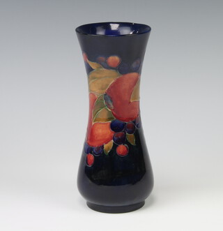 A Moorcroft blue ground pomegranate vase with impressed signature 18cm 