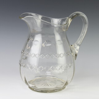 A large baluster cut glass water jug 28cm 
