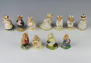 Eleven Royal Doulton Brambly Hedge figures - Lady Woodmouse DBH5 9cm, Poppy Eyebright DBH1 10cm, Mrs Apple DBH3 9cm, Lord Woodmouse DBH4 8cm, Mrs Apple DBH2 9cm, Mrs Toadflax DBH11 9cm, Dusty Dogwood DBH6 9cm, Mrs Toadflax DBH11 9cm, Wilfred Toadflax DBH7 8cm, Primrose Picking Berries DBH33 8cm and Dusty and Baby DBH26 10cm  