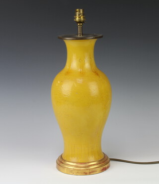A Chinese antique style yellow glazed oviform vase decorated with leaves and scrolling flowers, converted to a table lamp 35cm 