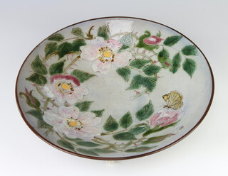 A Studio Pottery shallow dish decorated with flowers 33cm 