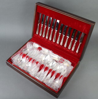 A silver plated canteen for 6 contained in a mahogany finished box 