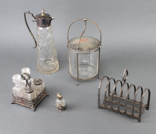 An Edwardian cut glass silver plated mounted ewer, a 7 bar toast rack and minor plated wares 