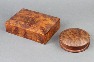 A rectangular figured walnut trinket box with hinged lid 4cm h x 17cm w x 12cm d together with a cylindrical ditto 4cm h x 11cm diam. 