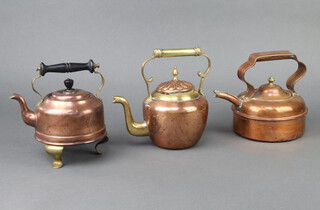 A 19th Century copper and brass squat shaped kettle 17cm x 14cm (some dents), 1 other 19cm x 9cm and an early electric kettle 17cm x 13cm 