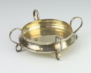 A silver Art Nouveau style four handled shallow dish, Birmingham 1951, 7cm, 60gms