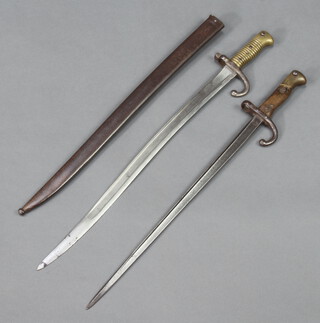 A French chassepot bayonet complete with scabbard, the back of the blade dated 1868 together with 1 other (no scabbard)