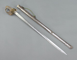 A Victorian Infantry Officer's sword, the 82cm blade etched with Royal cypher and with gilt hilt, complete with scabbard 