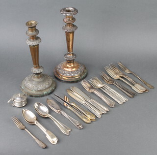 A collection of minor silver plated cutlery including 2 candle sticks (1 a/f)