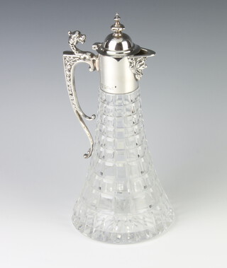 A cut glass silver mounted claret jug with floral spout and dragon thumbpiece Sheffield 1991, 30cm 