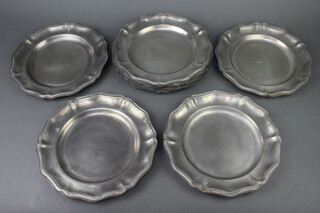Ten 20th Century, 17th Century style Continental pewter plates with bracketed borders 27cm 