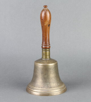 A brass hand bell with turned wooden handle marked WH10 27cm x 12cm 