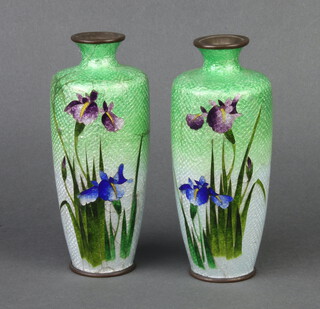 A pair of green ground and floral patterned cloisonne enamelled vases 14cm x 4cm, decorated iris (both a/f) 