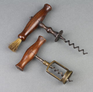 A 19th Century steel and mahogany corkscrew and 1 other 
