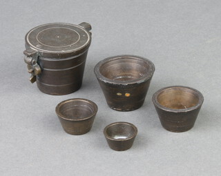 Four 19th Century bronze stacking bucket weights 4cm x 4.5cm 
