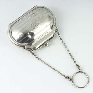 A silver engraved purse Birmingham 1918 with monogrammed cartouche 8cm, 52 gms 