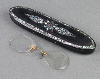 A pair of 19th Century pince nez contained in a boat shaped lacquer and inlaid mother of pearl spectacle case 2cm x 15cm x 4cm  