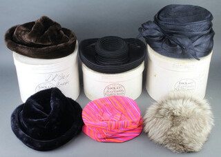 Albert Johnson of New Bond Street, a lady's 1960's circular orange and purple striped hat, a lady's Dollargrand simulated fur hat and 3 other hats, all contained in Lock & Co hat boxes  