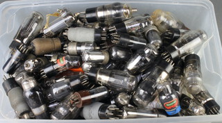 A collection of various Brimar, Marconi and other valves contained in a plastic crate 