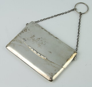 A silver purse and chain, London 1915, gross weight 92gms 